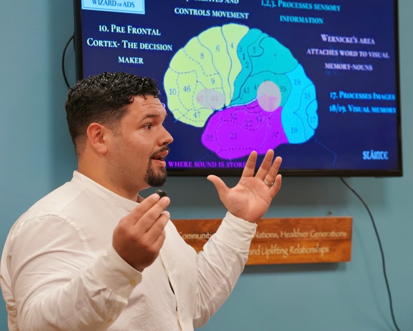 Dr. Vincent Farrar teaching about the brain and nervous system at Sláinte Chiropractic